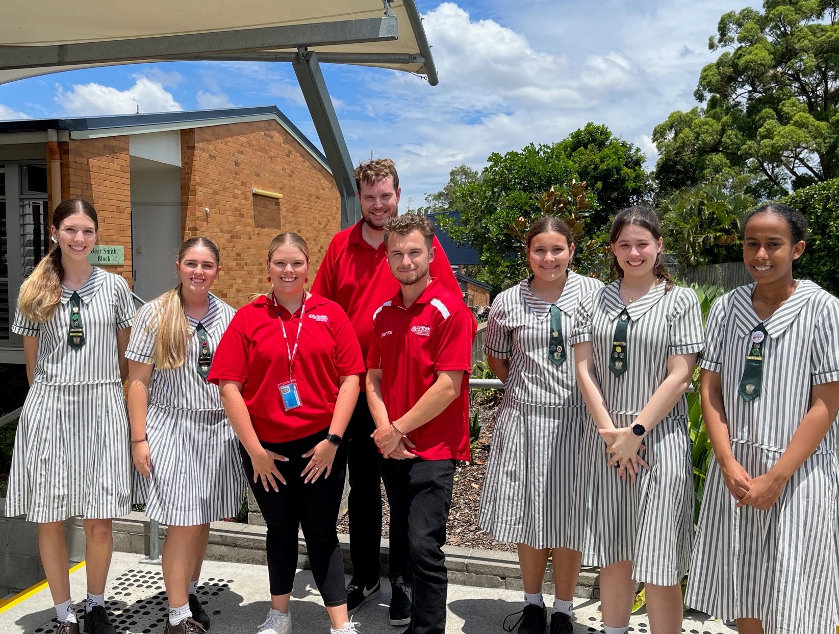 Students pose with Griffith University staff