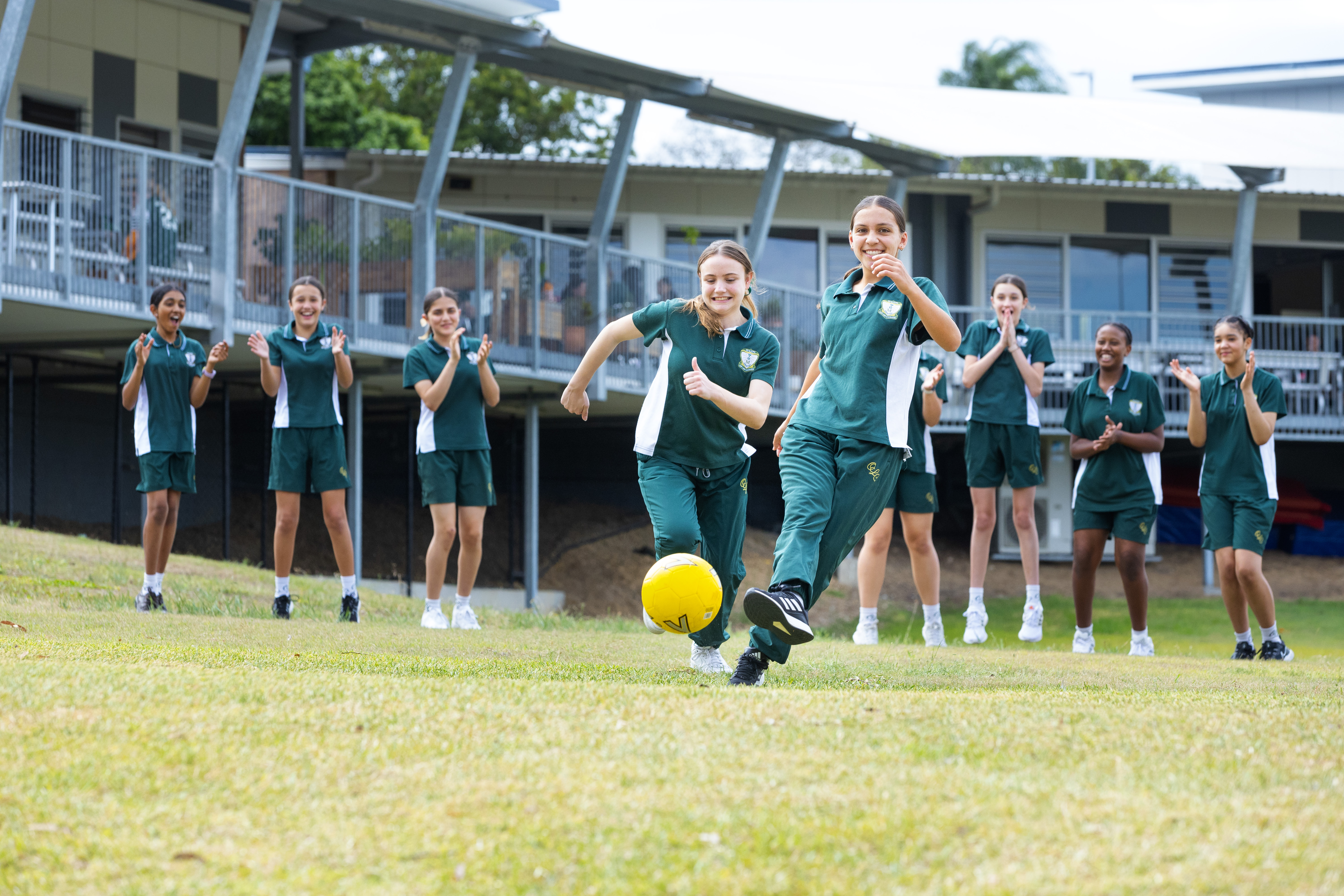 group of girls playing soccer